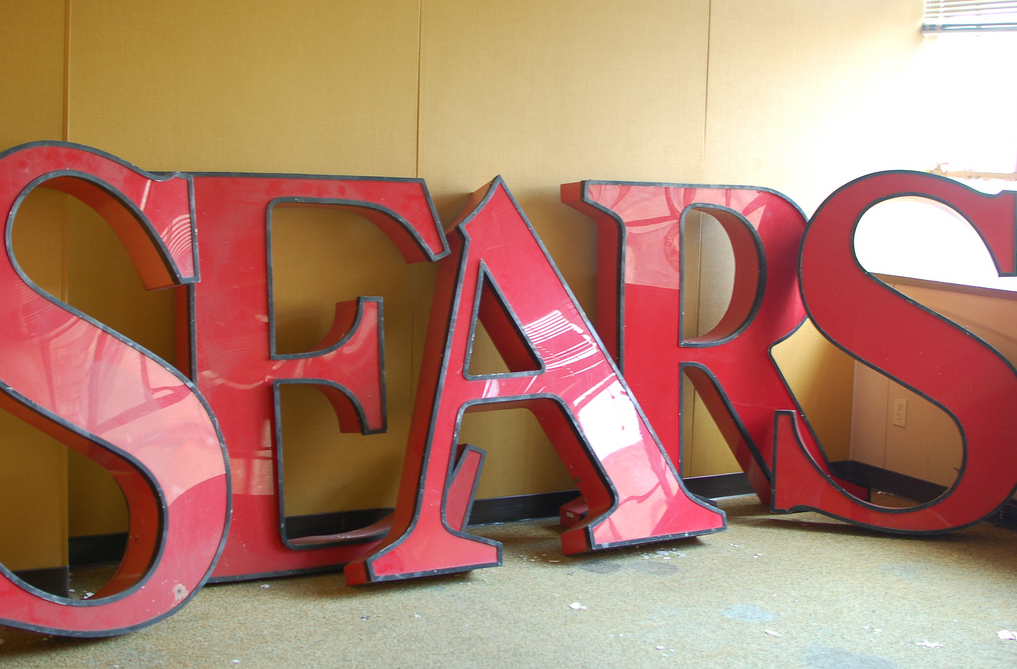 Sears sign dismantled 