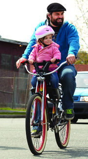 Family on bike by Christopher Cotrell on Flickr