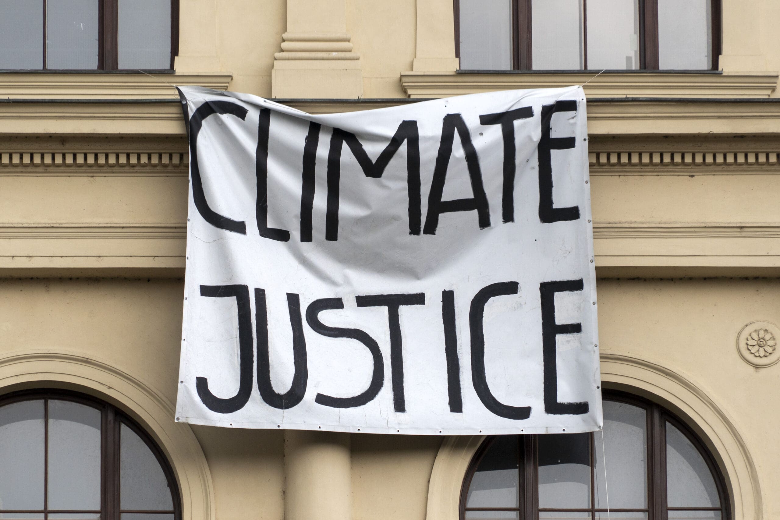 Climate Justice Banner outside building school university