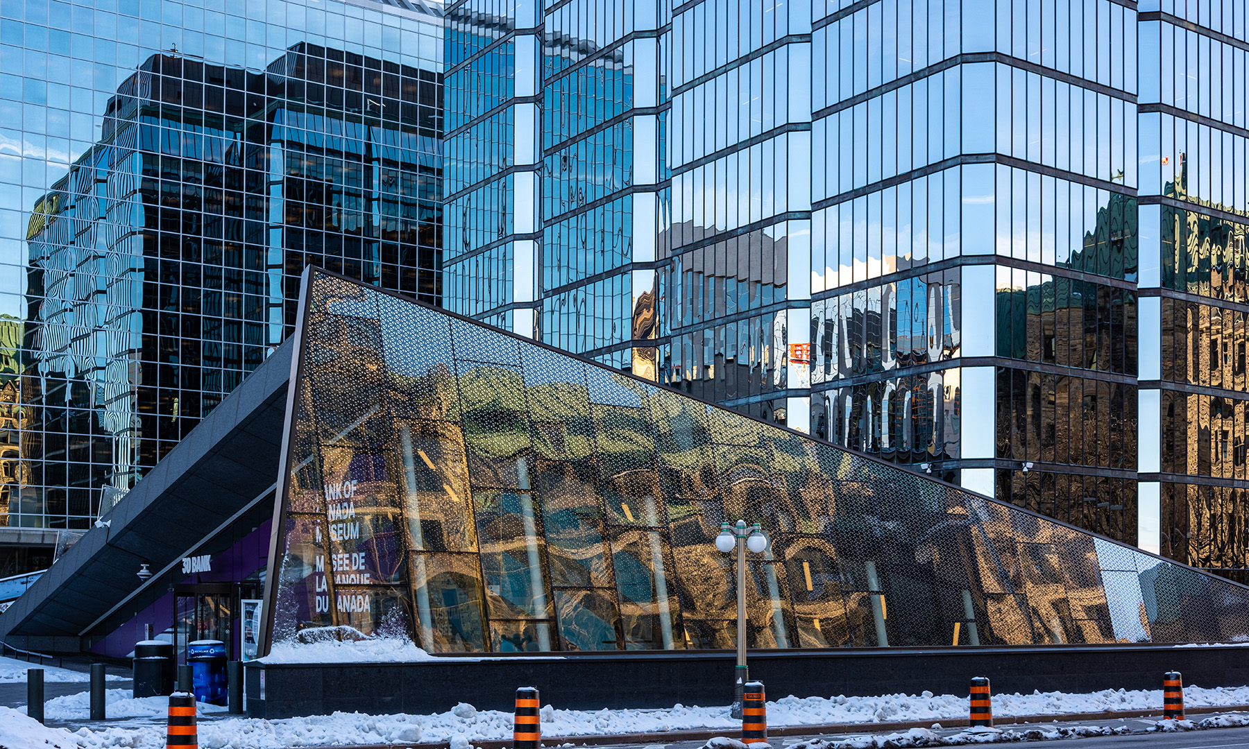 Bank in Ottawa, mirrors with parliament in reflection