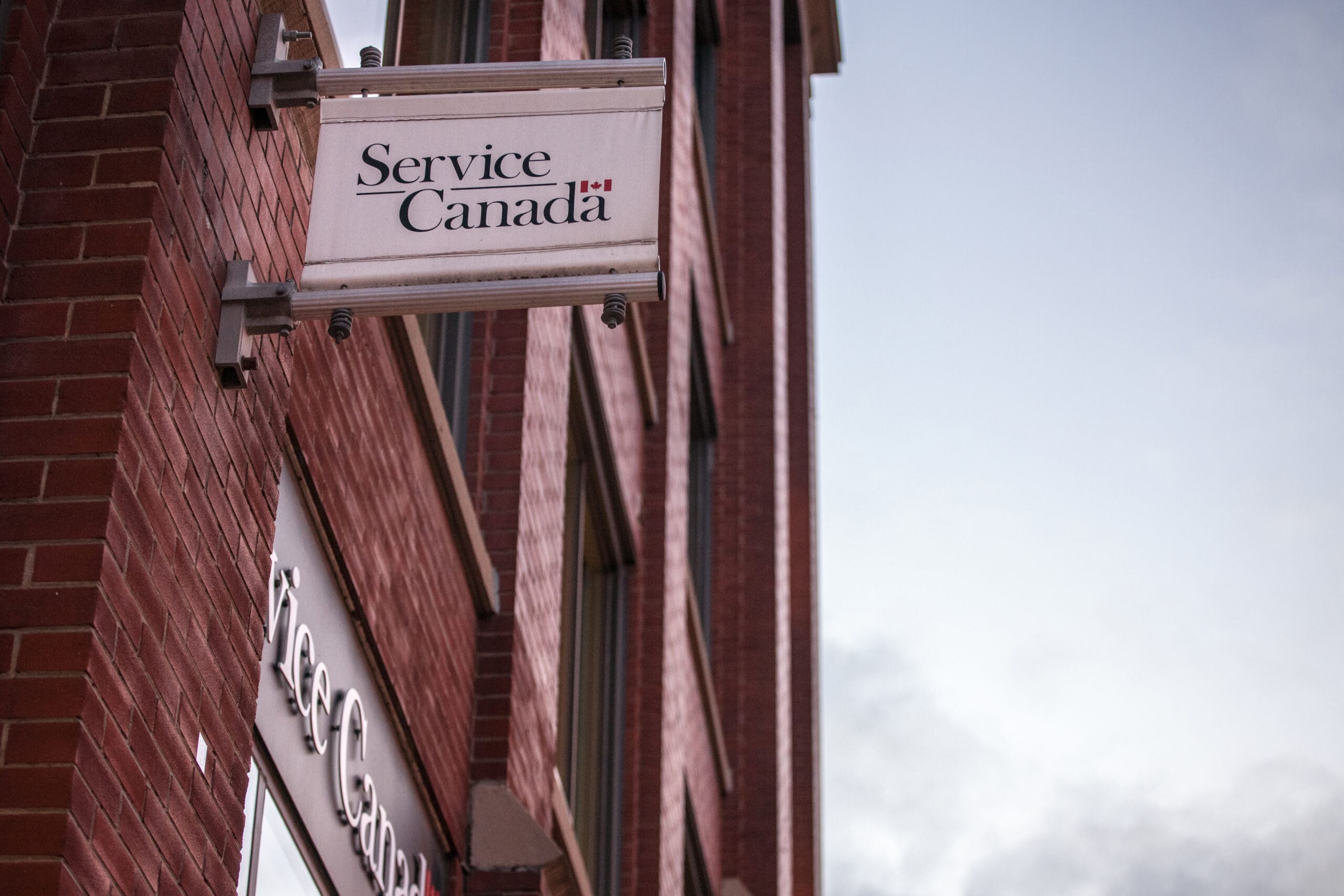 Picture of a Service Canada sign on their office in Toronto, Ontario, Canada. Service Canada is the body of the Canadian government in charge of representing all public federal administrations to the citizens