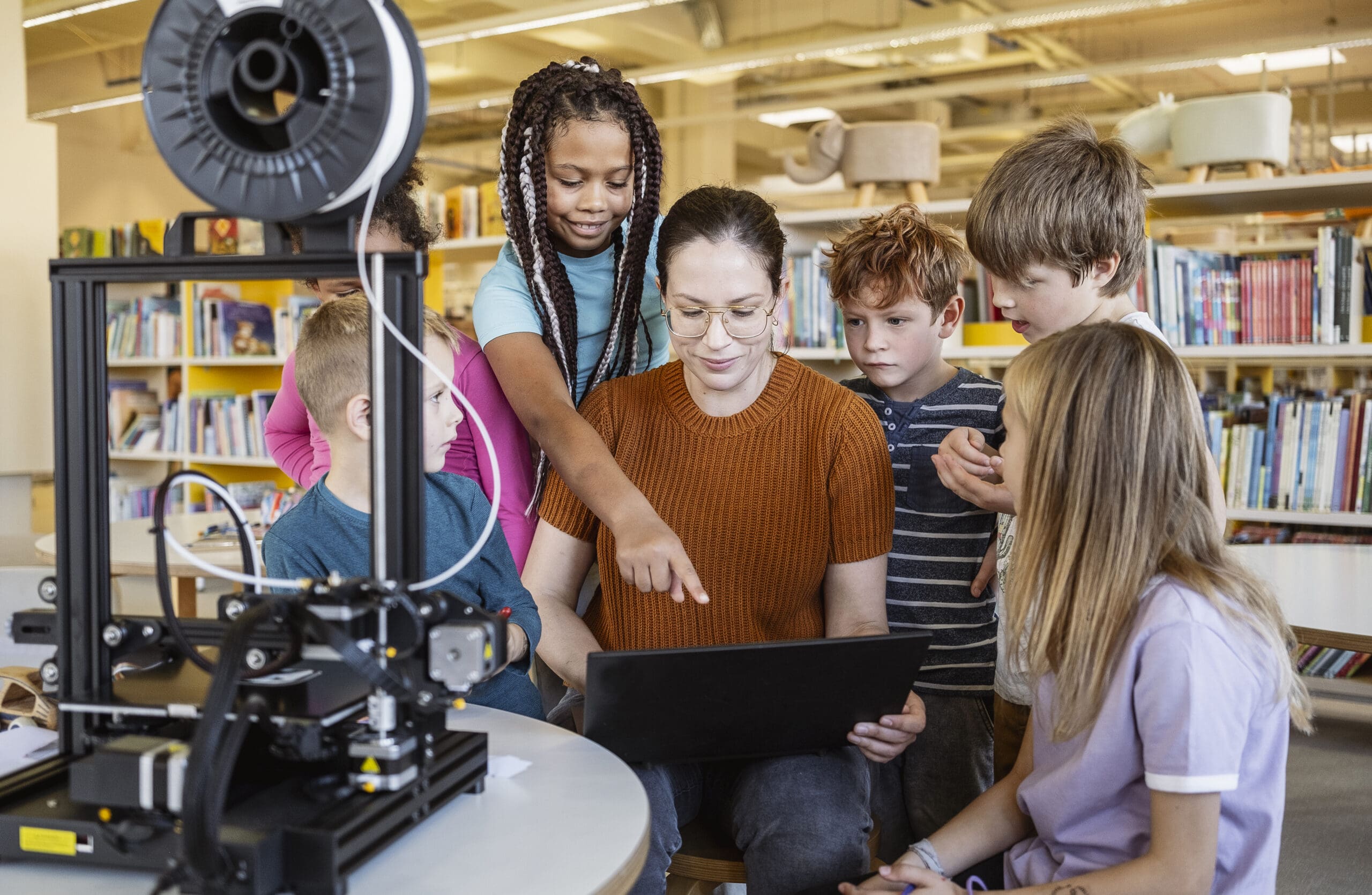 Children learning about 3D printing