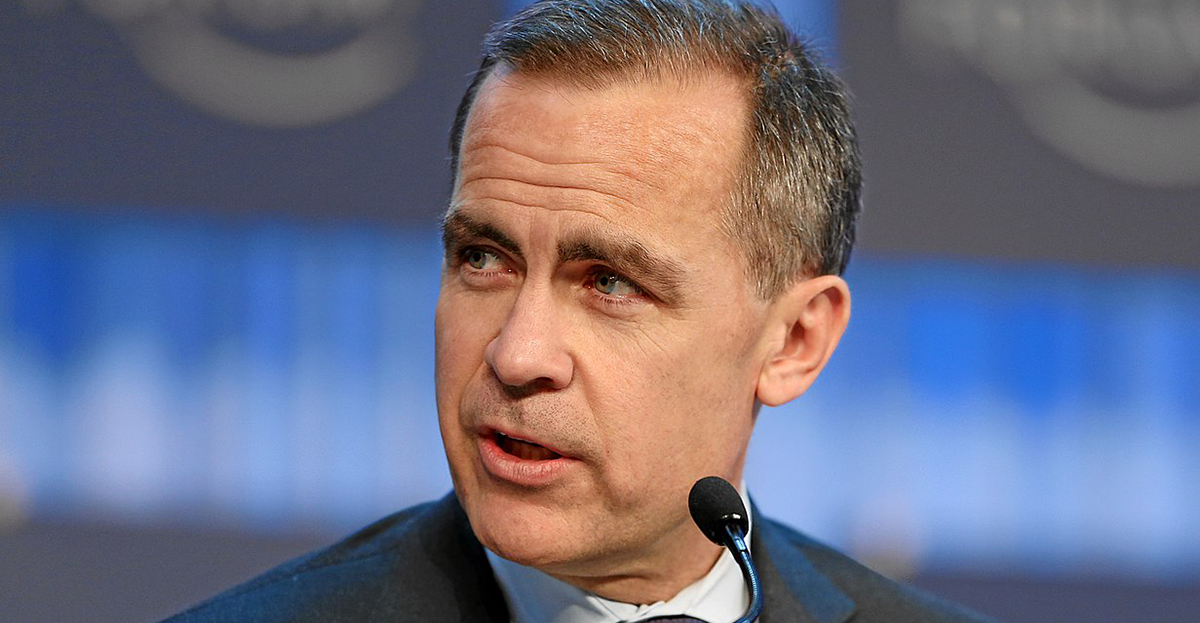 Mark Carney speaking at a podium